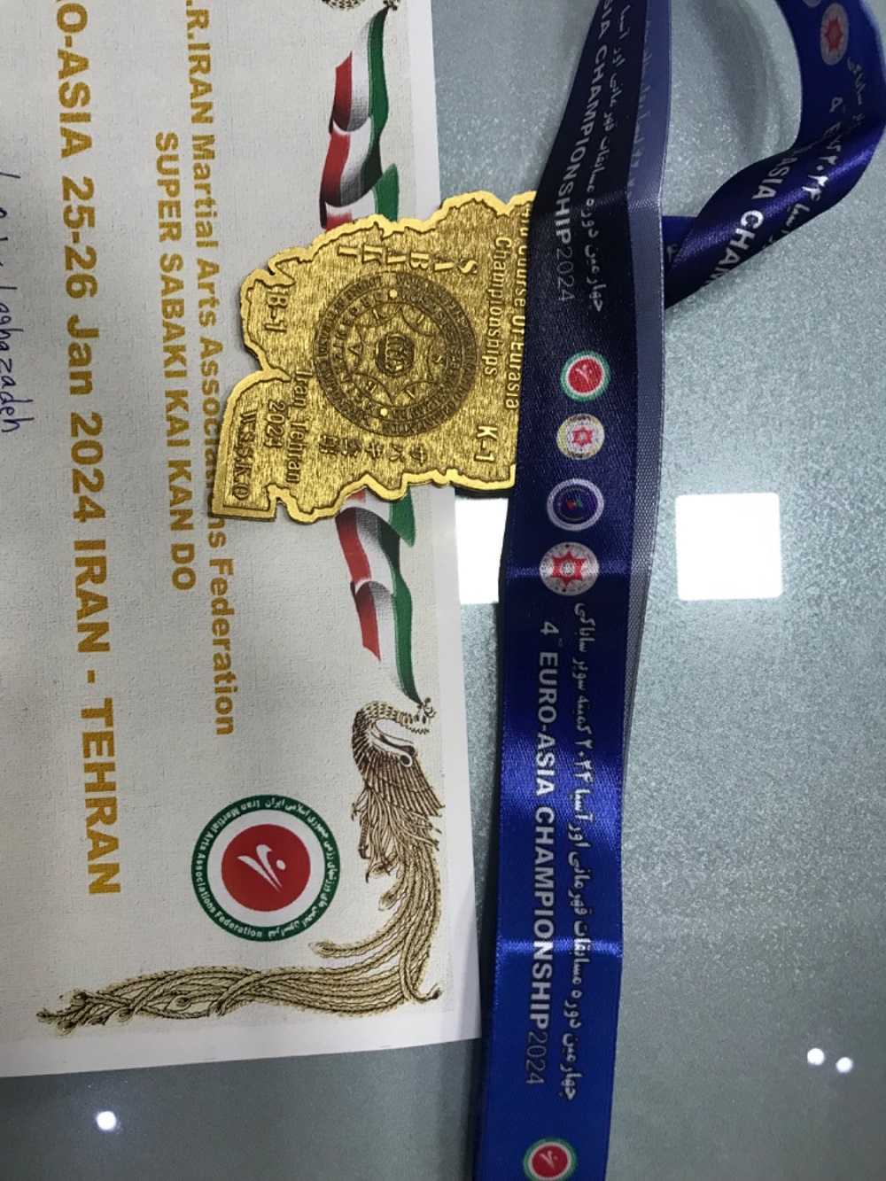 کسب مقام اول قهرمانی کیوکاشین کاراته  اوراسیایی توسط بهراد آقازاده پایه نهم 